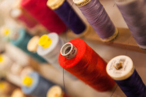 Use a tailor to update your wedding guest wardrobe.